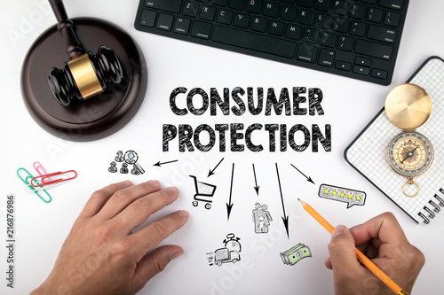 consumer protection, Law and justice concept. Chart with icons. Judge hummer and compass on the desk for setting order right direction