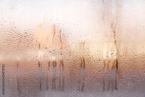 Rain or water drops on window glasses. Abstract background. Copy space.