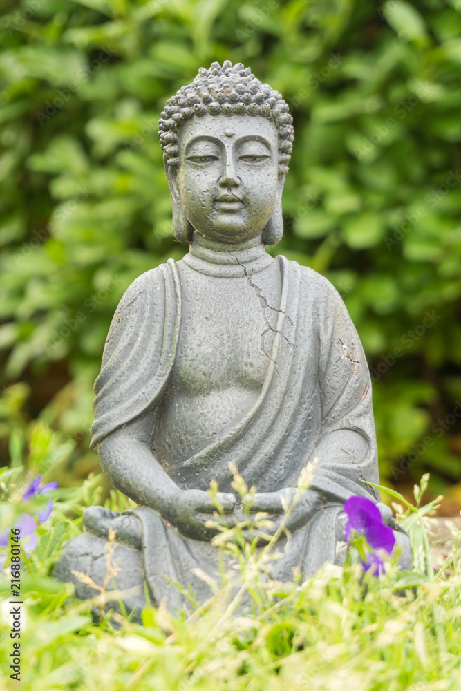 Buddha statue in the garden Buddha statue in the garden