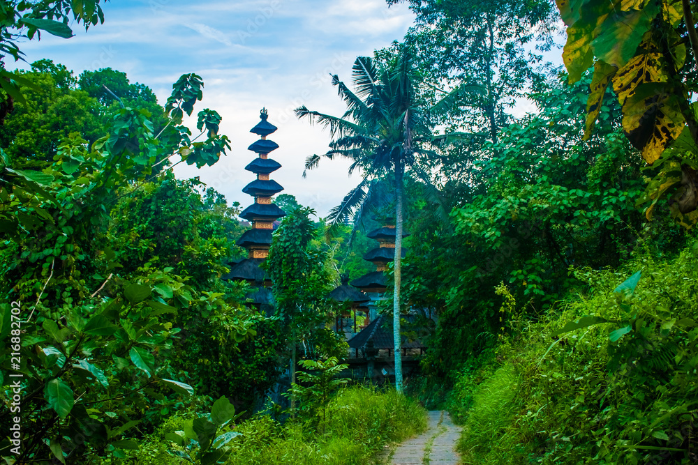 Fototapeta premium Near the facade of Hindu Temple Pura Gunung Lebah in Ubud, the view from Campuhan bridge, Bali Island in Indonesia