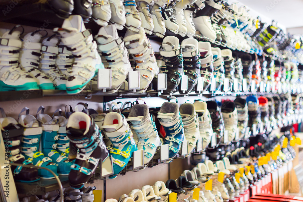Image of colorful ski boots on showcase