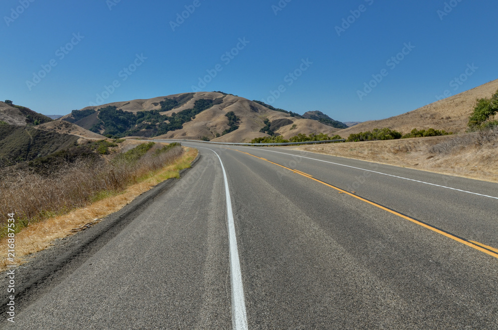 Eric Seastrand Memorial highway (CA-46) passing through hills near Cambria San Luis Obispo county, California, USA