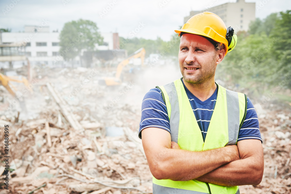 Demolition construction work. Worker at building site Demolition construction work. Worker at building site