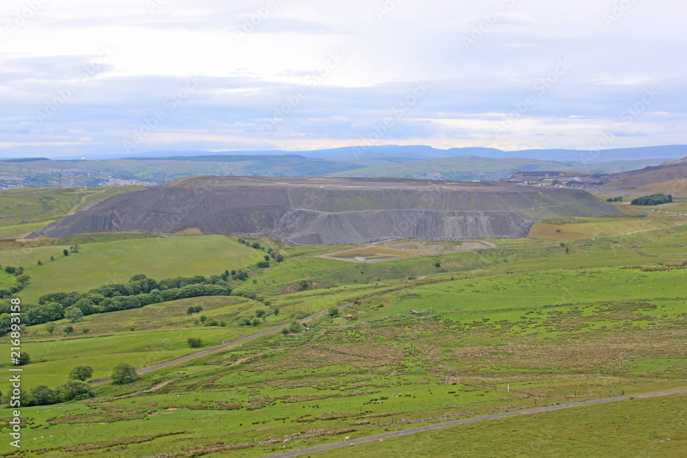 Welsh hills by a coal mine slag heap