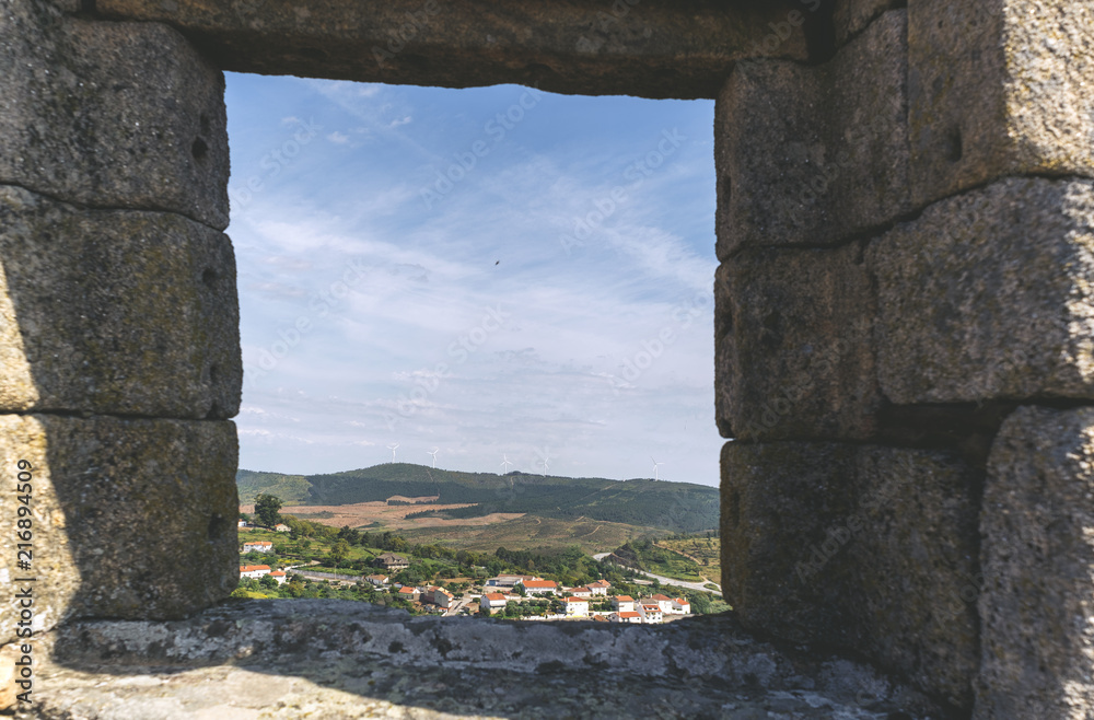 View from the stone window of Castle of Monsanto, Portugal. Window view.