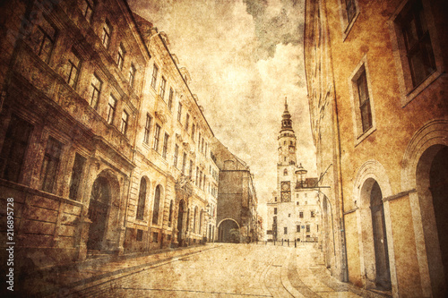 View at facade of old building in Germany. Image made in old color style photo