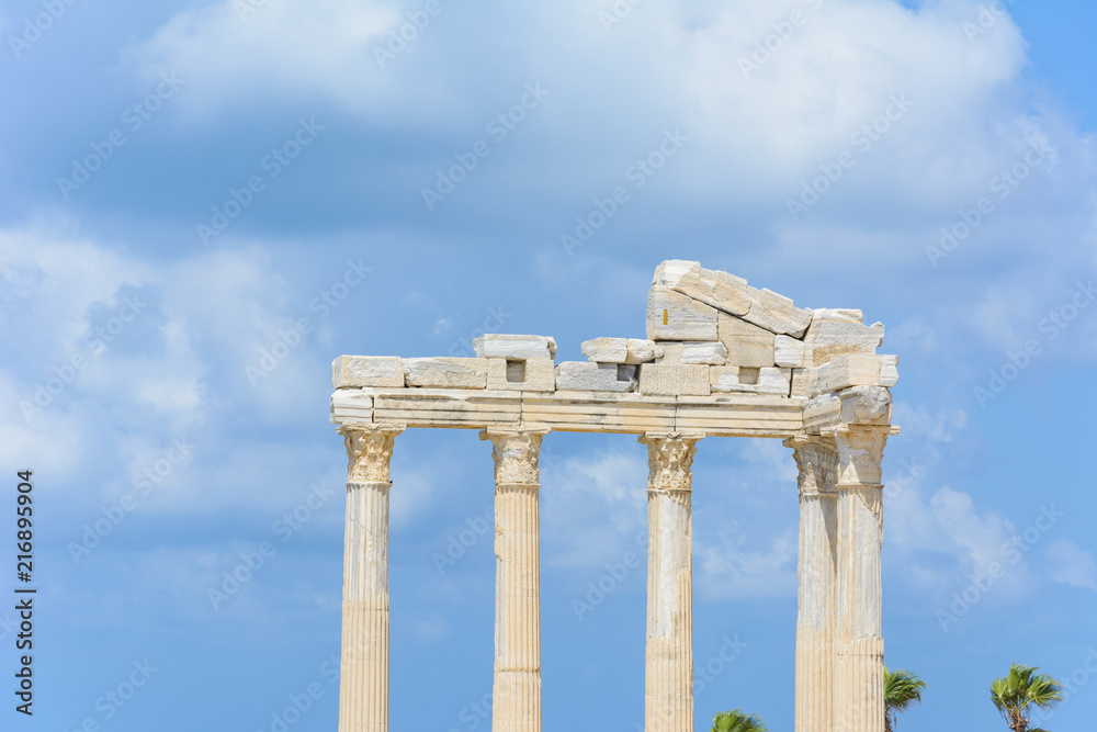 the ruins of the ancient temple of Apollo after the earthquake. Thick clouds in the sky. Side, Turkey