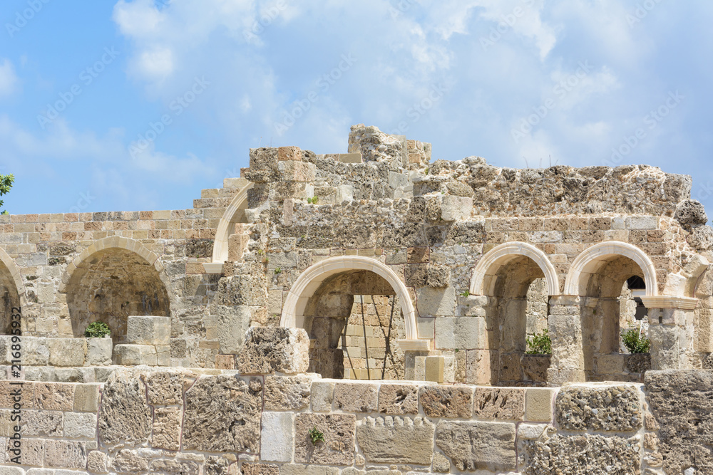 the ruins of a Roman Basilica on the Mediterranean sea. Arch opening. Side, Turkey
