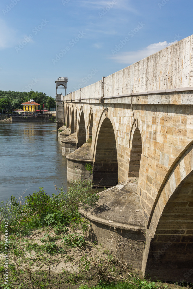 Obraz premium Medieval Bridge from period of Ottoman Empire over Meric River in city of Edirne, East Thrace, Turkey