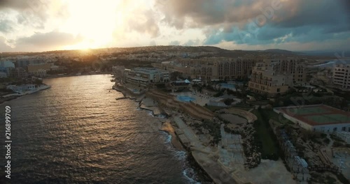 Aerial shot on a cloudy day during sunset in Malta