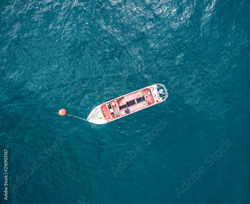Aerial view of a boat standing in the sea, top view