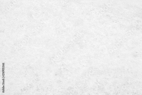 Art concrete or stone texture for background in black, grey and white colors. Cement and sand wall of tone vintage.