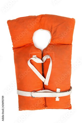 Old vintage life vest  with straps forming a heart on a white background