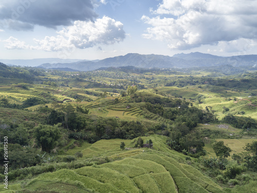 Clouds rolling over the Golo Cador Rice Terraces in Ruteng on Flores, Indonesia.