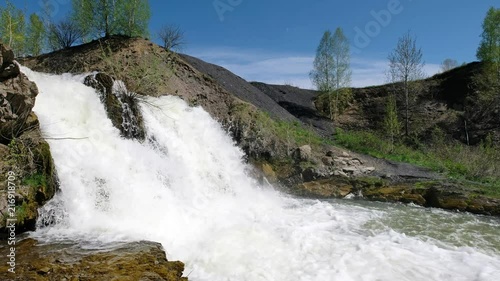 Waterfall and rocks on river Vydriha near village Belovo in Novosibirsk region,  Russia photo