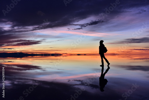 Calm woman dancing with sunset beach lake nature