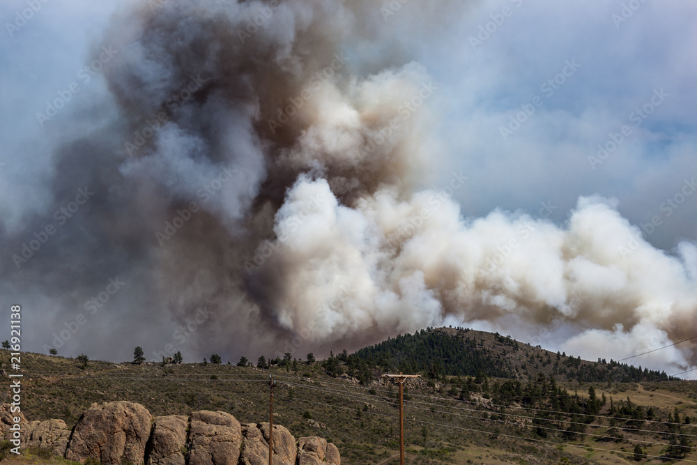 Wildfire Smoke Plume Billowing Over a Distant Hill in the Rocky ...