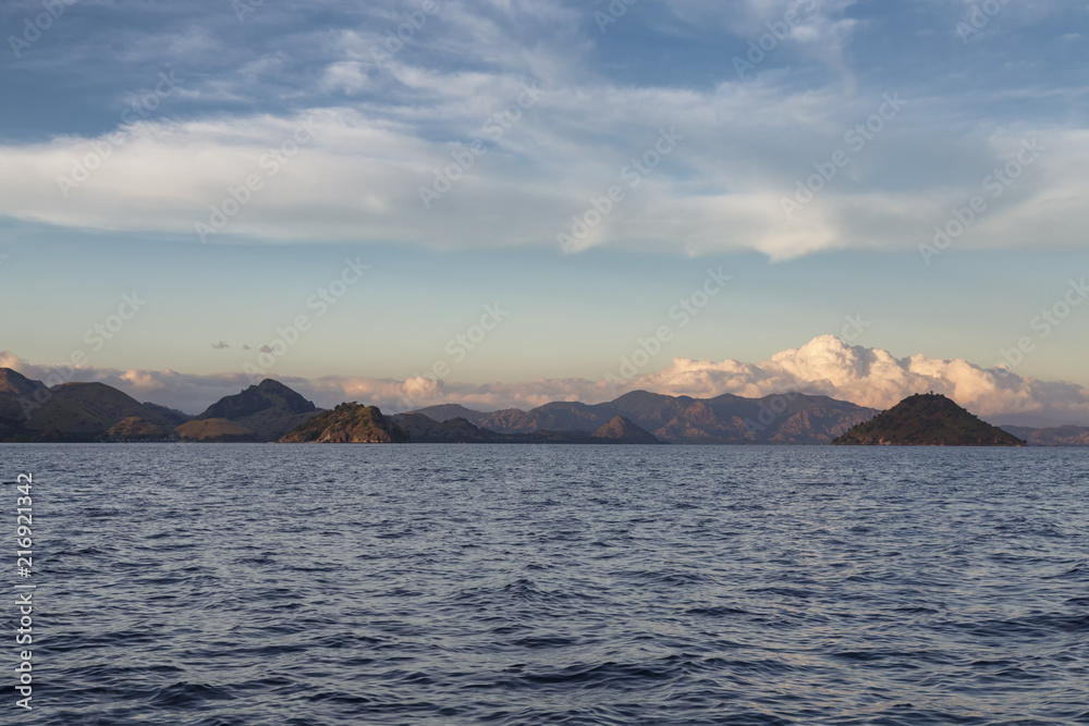 Multiple islands in the Komodo National Park at dawn. Multiple islands in the Komodo National Park at dawn.