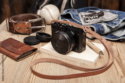 mirrorless camera with leather strap