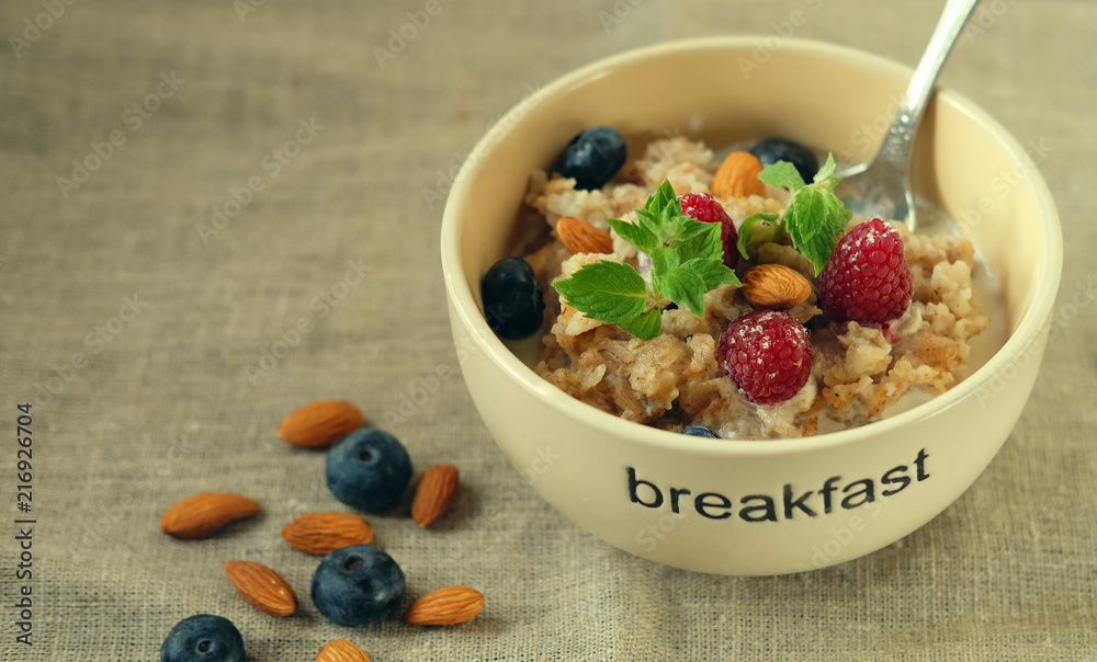 Granola with fresh organic raspberries and blueberries. Granola with fresh organic raspberries and blueberries.