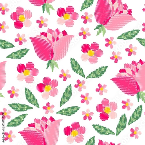 Vector embroidery seamless pattern with cute pink flowers on white background.