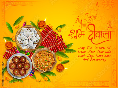 Burning diya with assorted sweet and snack on Happy Diwali Holiday background for light festival of India