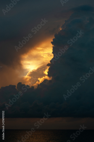 Dramatic sunset in the dark clouds