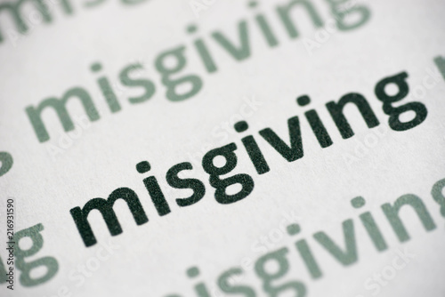 word misgiving printed on paper macro