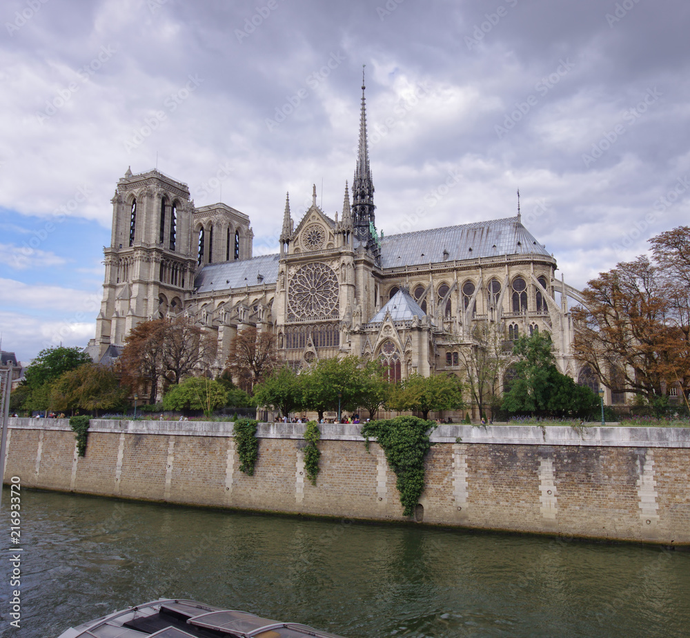 Notre Dame cathedral in Paris, France. dark clouds