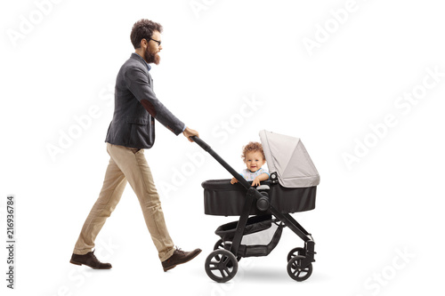 Father pushing a baby stroller
