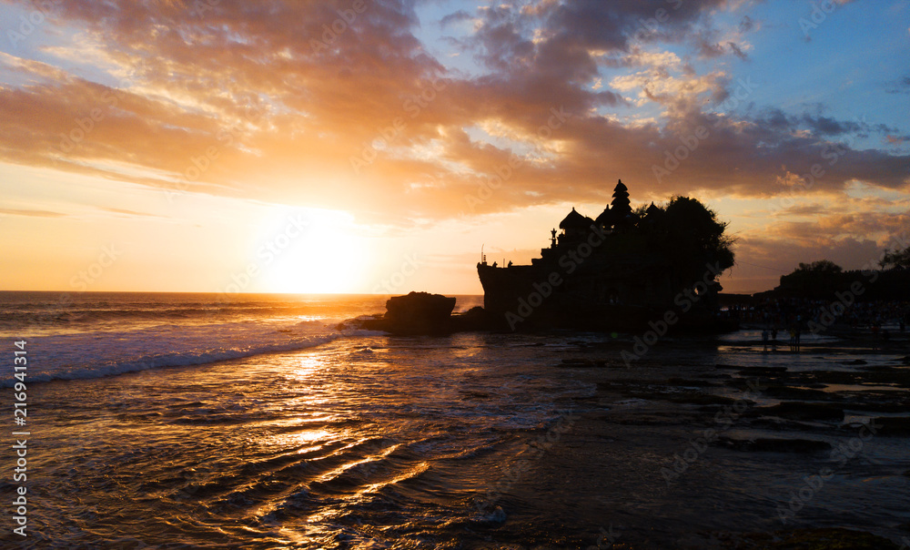 Tanah Lot in sunrise colors,the most famous temple at Bali island,Indonesia