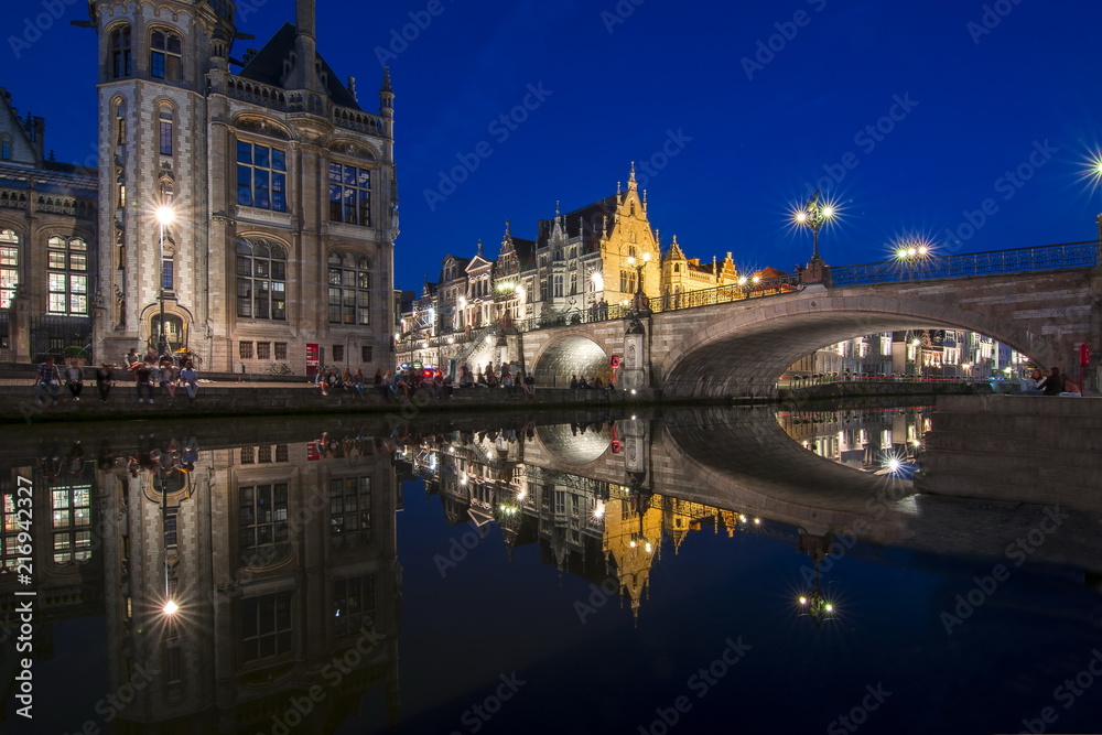 St. Michael's Bridge and Graslei quay in medieval Gent at night, Belgium