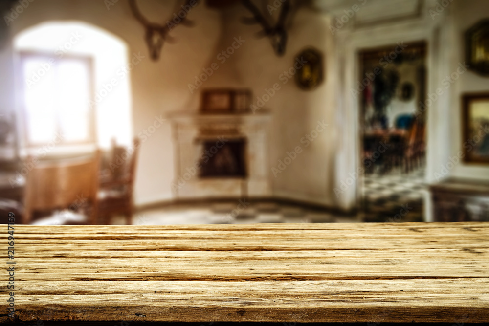 Table background of free space for your decoration and home interior with window and fireplace. Table background of free space for your decoration and home interior with window and fireplace.