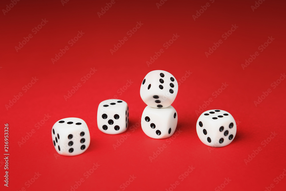 White dice on red background. Board game concept. White dice on red background. Board game concept.