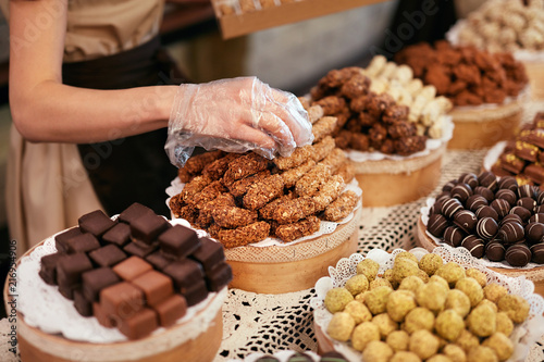 Chocolate Store. Chocolate Sweets On Shelves In Shop
