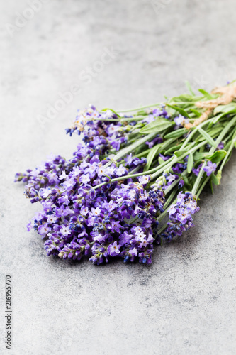 Fototapeta Naklejka Na Ścianę i Meble -  Lavender flowers, bouquet on rustic background, overhead.