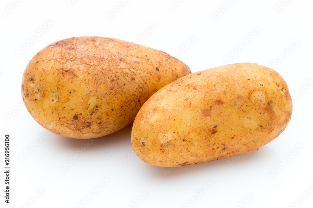A bio russet potato isolated white background. A bio russet potato isolated white background.