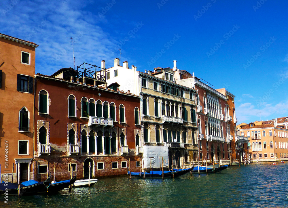 Colorful buildings and traditional boats Gondola