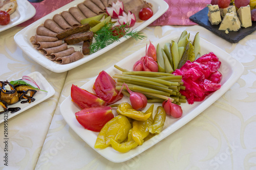 Vegetable and meat snacks on the Banquet table.