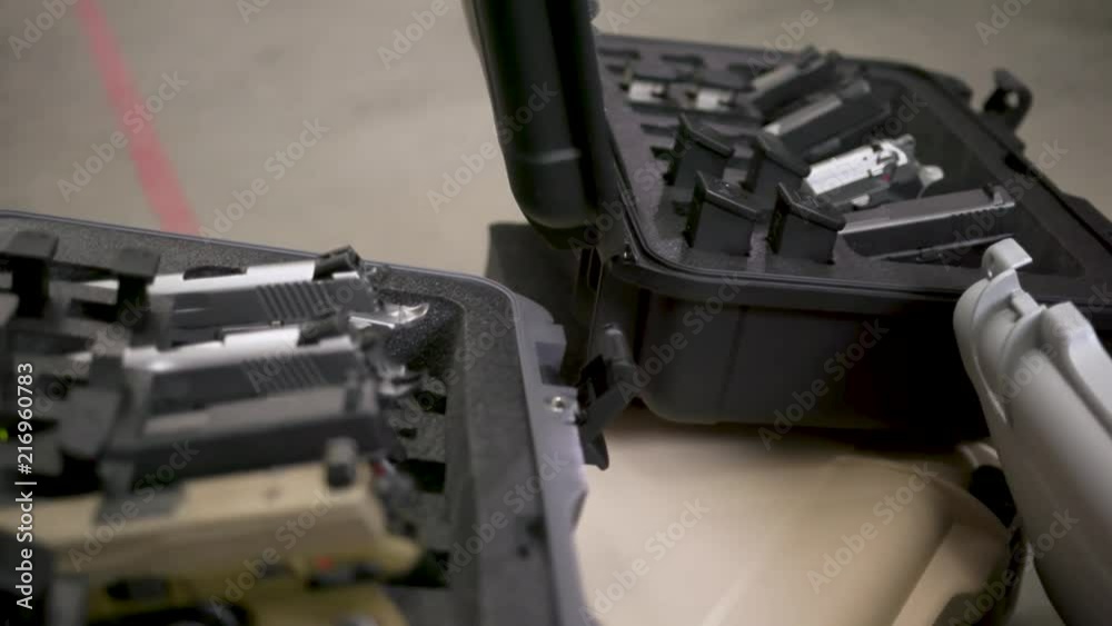Shot in Joliette, Quebec, Canada A bunch of cases filled with firearms, Shot in Joliette, Quebec, Canada A bunch of cases filled with firearms,
