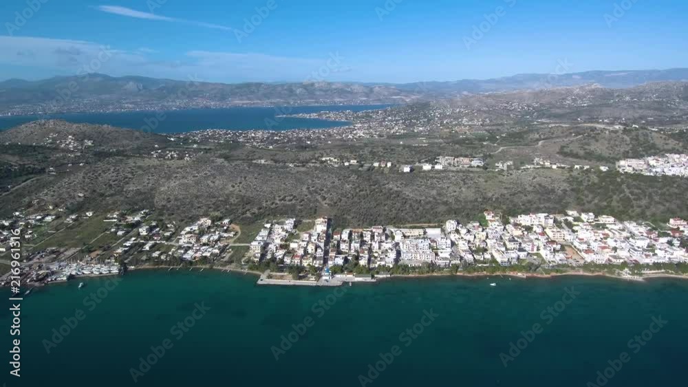 Aerial shot over Salamina island in Greece. View of the island city and port. Location near Athens. Aerial shot over Salamina island in Greece. View of the island city and port. Location near Athens.