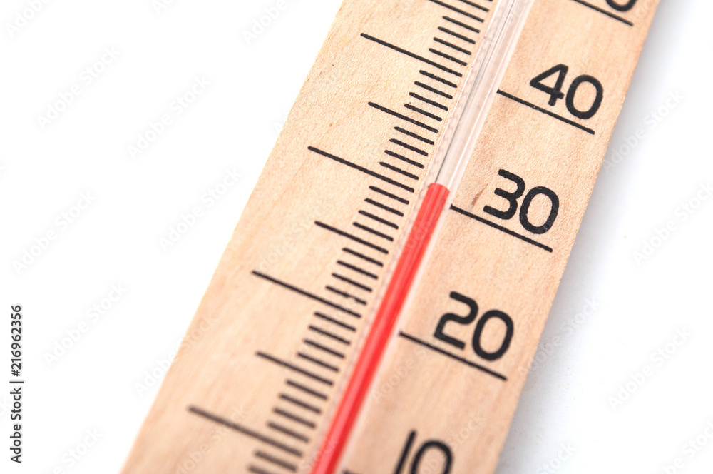 closeup of wooden thermometer on white background closeup of wooden thermometer on white background