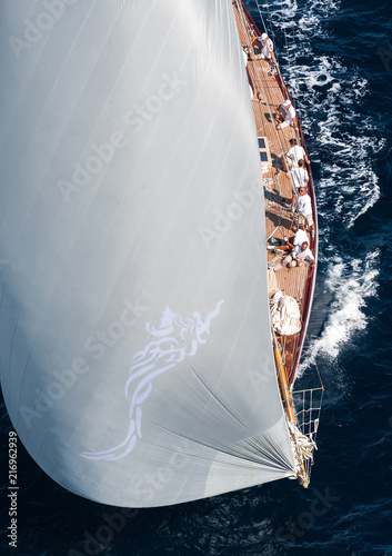 French Riviera - old sail race above aerial view of boat front
