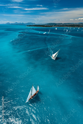French Riviera - old sail race above aerial view in Cap d'Antibes