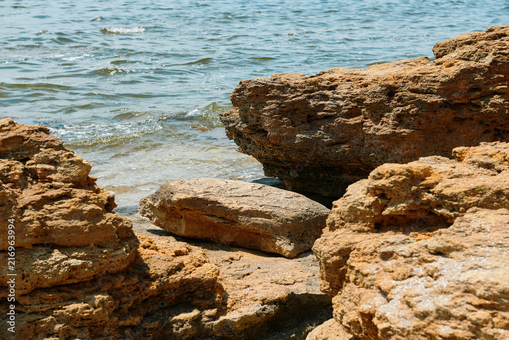 stones on the beach, beautiful sea summer landscape, wild beach closeup