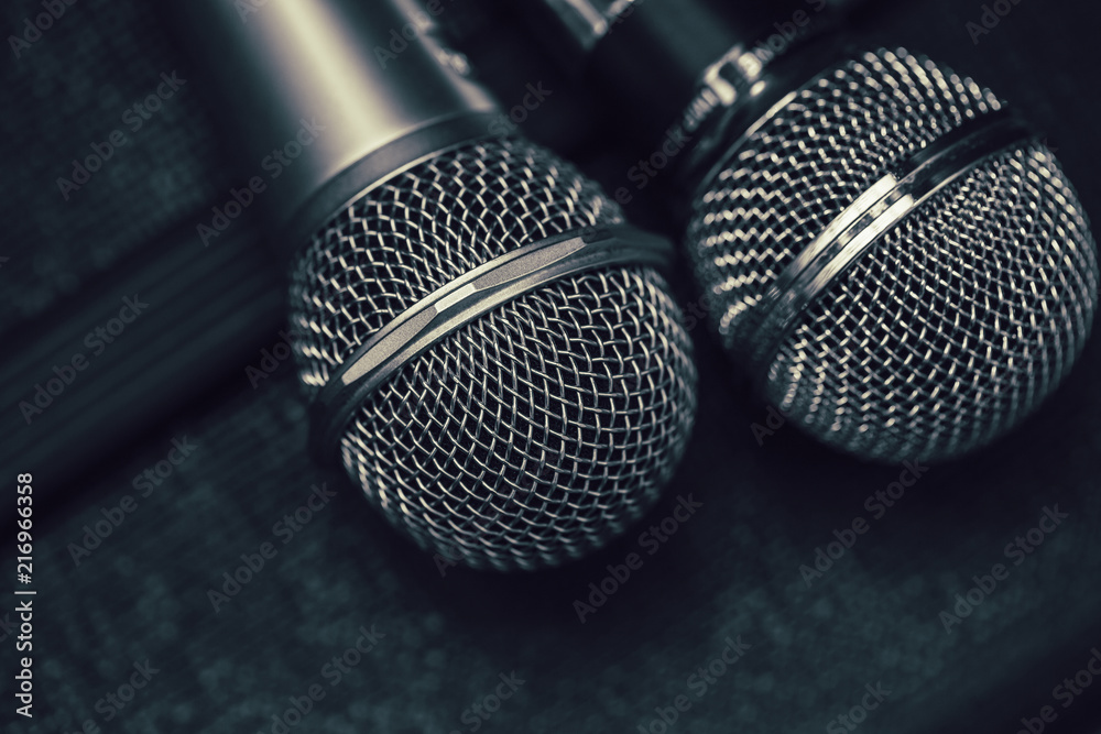 Obraz premium Two microphone for duo sing a song or Karaoke concept