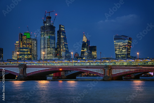 Blackfriars Bridge and the City of London at night in August 2018