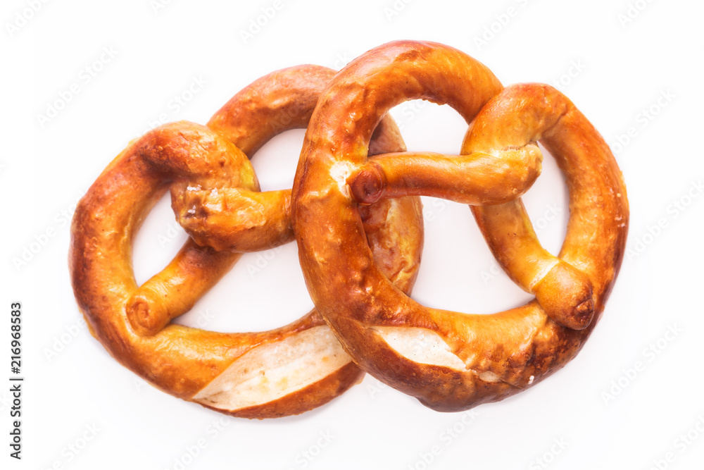 Homemade twisted knot Soft salt Pretzels on white background Homemade twisted knot Soft salt Pretzels on white background