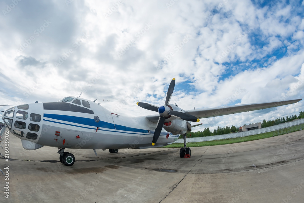 Funny turboprop plane with two engines Is standing at the airbase. observation aircraft. aerial photography. Search plane. Funny turboprop plane with two engines Is standing at the airbase. observation aircraft. aerial photography. Search plane.