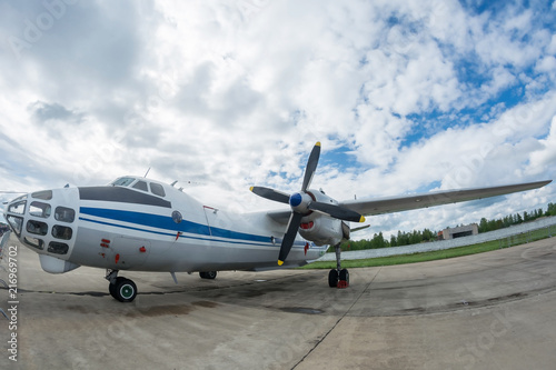 Funny turboprop plane with two engines Is standing at the airbase. observation aircraft. aerial photography. Search plane.